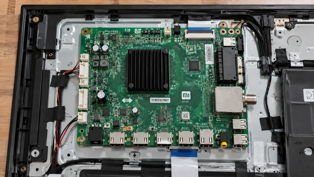 Mi Smart TV internal motherboard circuit board with processor and HDMI ports